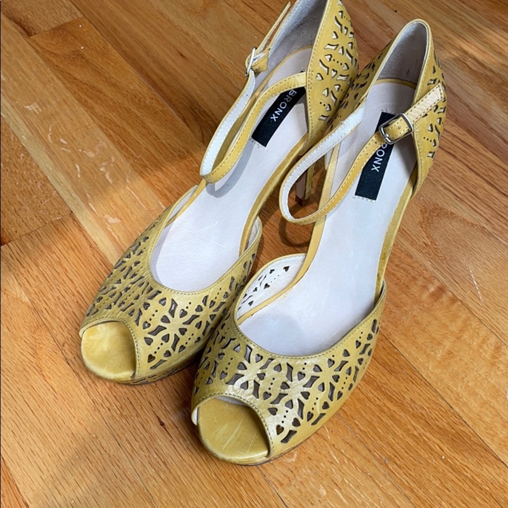 Distressed yellow leather platforms